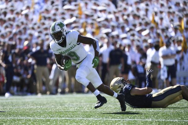 Marshall thunders past Navy 49 7 Ali scores 4 in debut AP News